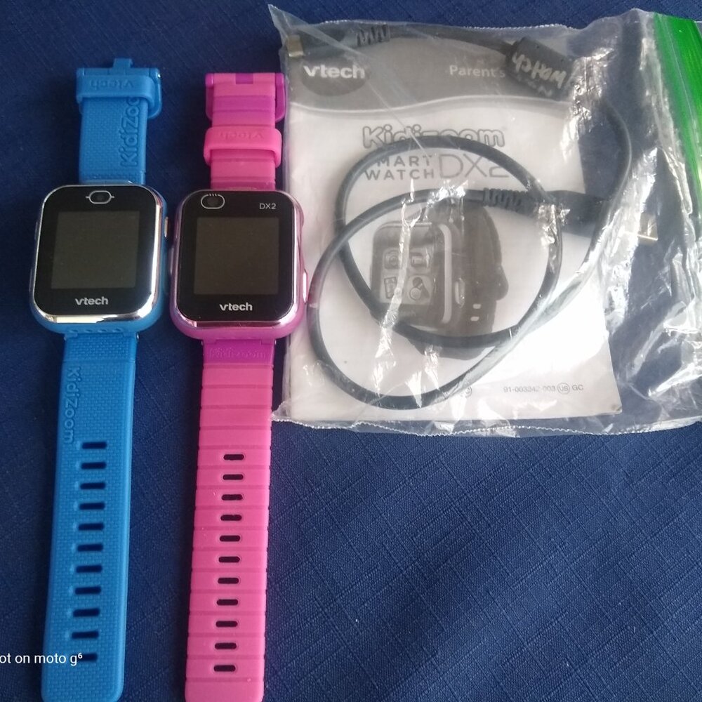 2 kid smartwatches, Vtech DX2 (pink) and Vtech DX3 (kidizoom)